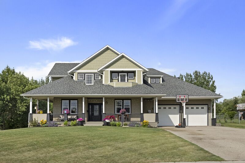 Craftsman-style home exterior with a wraparound porch